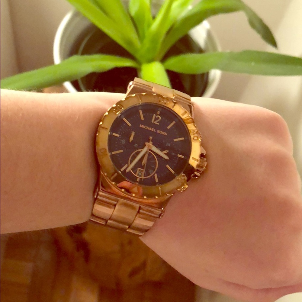 Rose gold with blue center Michael kors watch